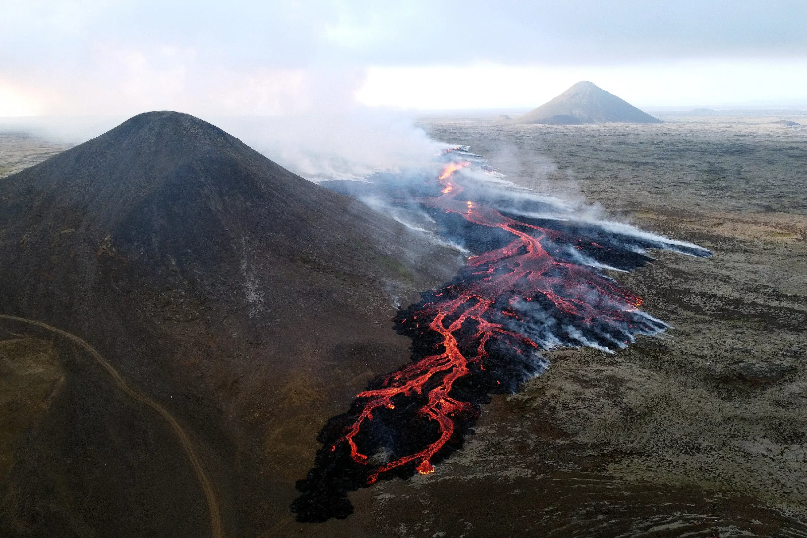 Icelandic volcano eruption. Вулкан в Исландии фаградальсфьядль. Вулкан в Исландии 2023. Извержение вулкана в Рейкьявике. Извержение вулкана Шивелуч 2023.