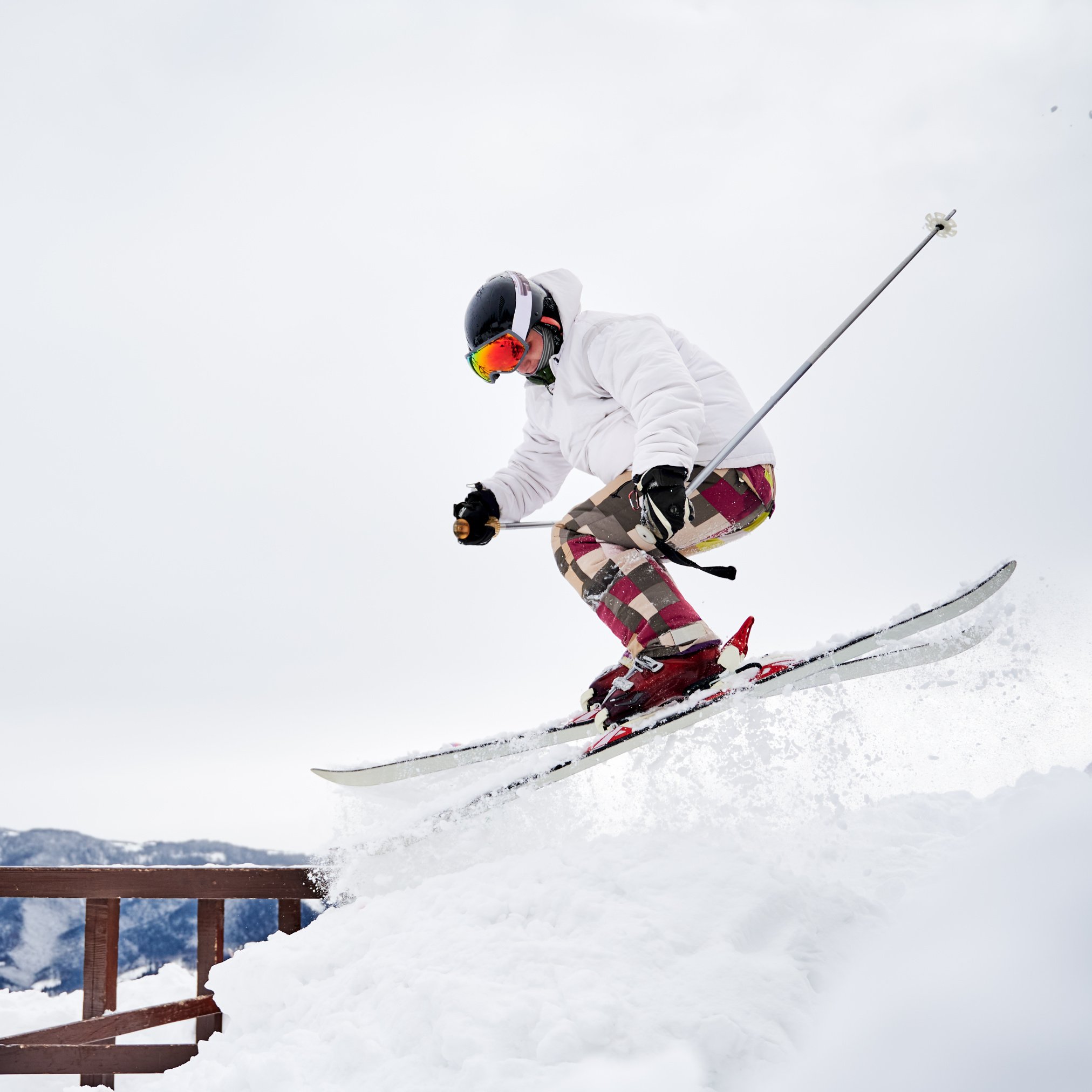 male-skier-skiing-downhill-trough-deep-powder-snow (1).jpg